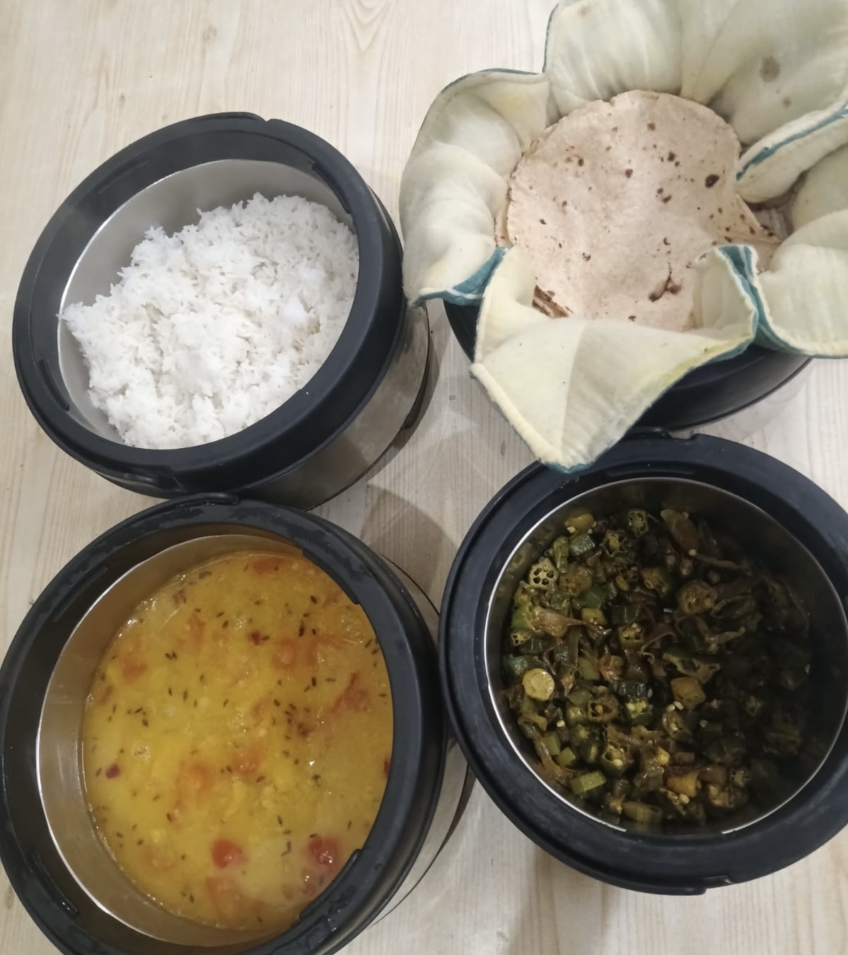 Home-style rice, roti, dal and vegetables